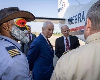 Joseph Tua, King Charles, Dave Fyock and Simon Wunderli in front of the new MAF aircraft
