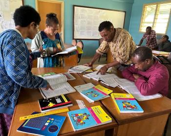 Bilum Books training course with teachers sitting around tables and working in groups