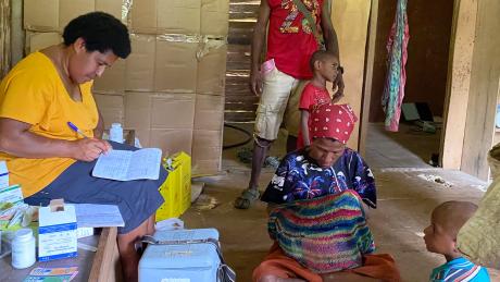 Malaumanda health patrol. nurse with patients