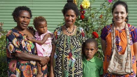 Group photo of Selah holding a toddler, Jesslyn and Richard and Bernadette Axon