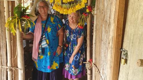 Anne Thomas (left) and Heather Robertson (right) posing at a Sepik River school they visited.