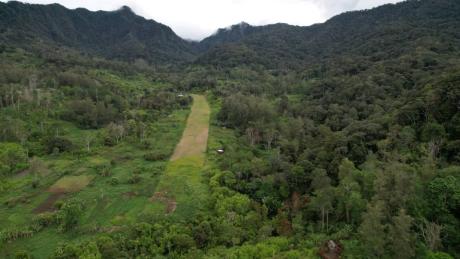 A remote airstrip in Papua New Guinea in a valley 
