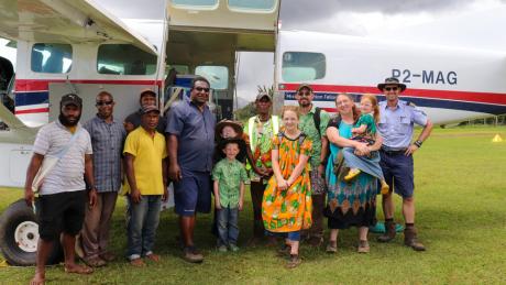 The Rowley family outside MAF plane