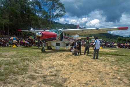 MAF C-208 plane lands at Auwi airstrip