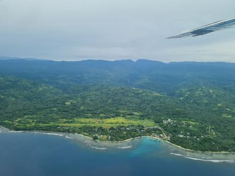 Wasu airstrip near the shoreline with the Etep Hospital located on the hill on the right, about a 30 minute drive away
