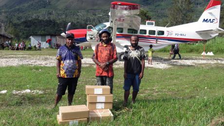 Some of the Feranmin teachers with their new books brought in by MAF