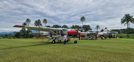two aircraft delivering supplies to Mougulu