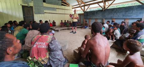 Yifki church service and Jonathan Kopf presenting a concordance to the people