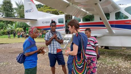Dr Diana Zwijnenburg screening patients under the wing before they are heading to Kompiam