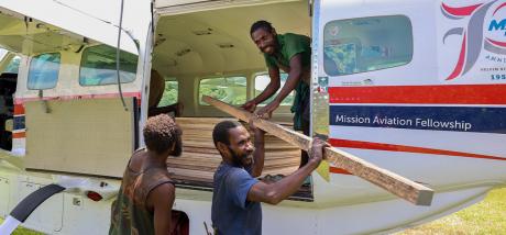 unloading buildimg material at Yifki for the school