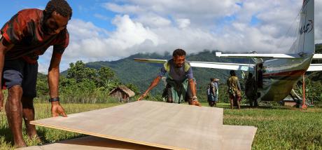 unloading buildimg material at Yifki for the school