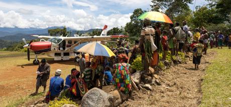 A huge crowd welcoming the aircraft and the Senisim Pasin Team.