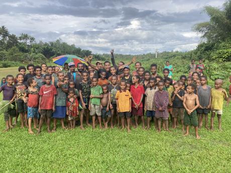 School children of Suabi posing for the camera at the airstrip