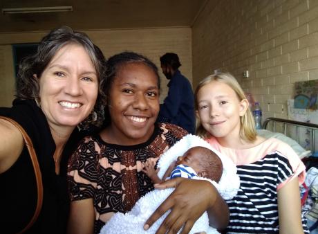 Michelle Venter with her daughter and a local young mother in Goroka.
