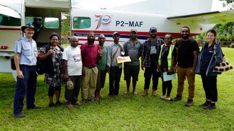 Ashley Leyenhorst and the MAF outreach team at Rum airstrip