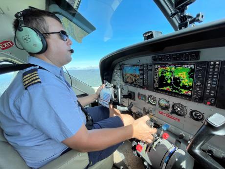 Tim Neufeld behind the controls of the Cessna Caravan