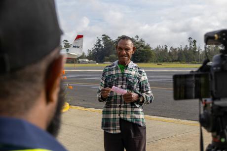 A man being interviewed on camera