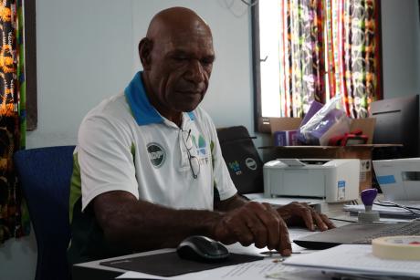 Philip Kongoi at his desk