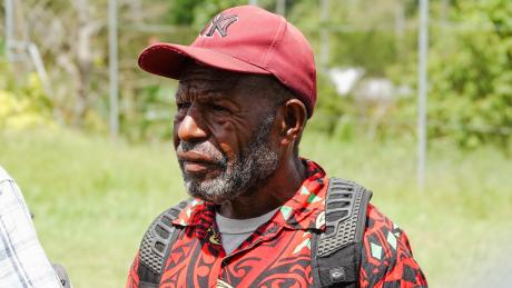 A man wearing a cap