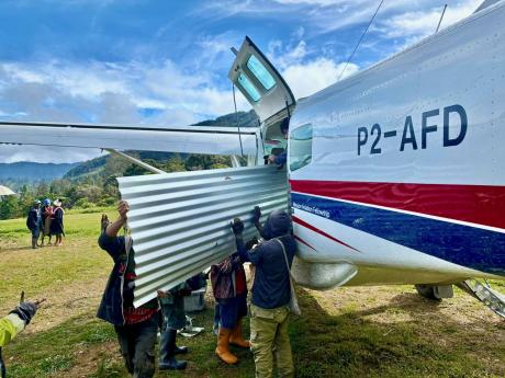 P2-AFD supplying trade-store supplies and iron roofing into Tekin.