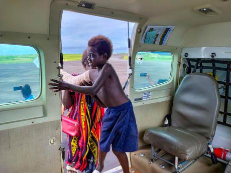 Louisiana Mangkkani with grand mother flown to Buka