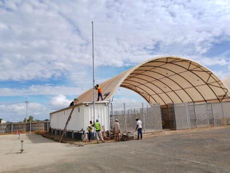 Relocation of the HF radio telemast to the new MAF hangar base in Balimo, Western Province.