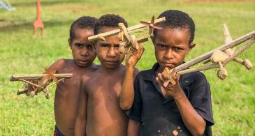 Kids with bamboo planes PNG